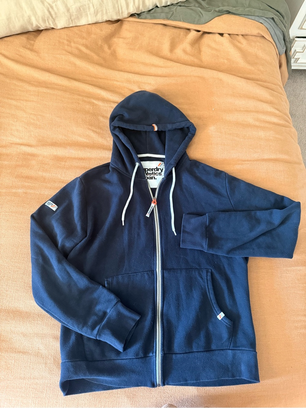 Superdry Navy Hoodie with White Drawstrings and Red Accent
